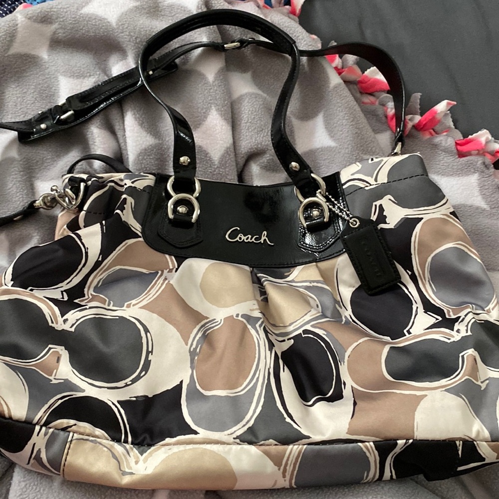 Black and Tan and gray Coach shoulder bag with duster bag